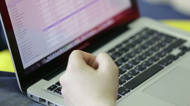 User Work With Laptop. Closeup