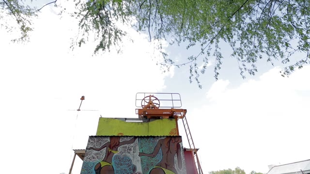 Water. Graffiti. Tower
