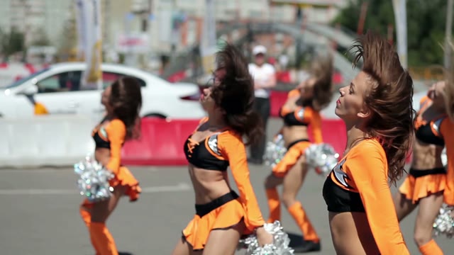 Cheerleader Dancing Outdoors
