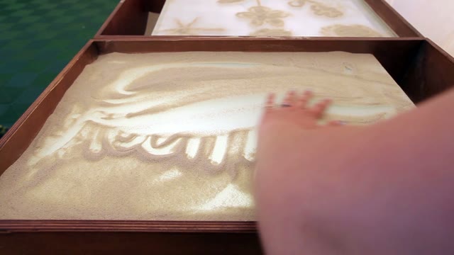 Hands Draw Sand Animation