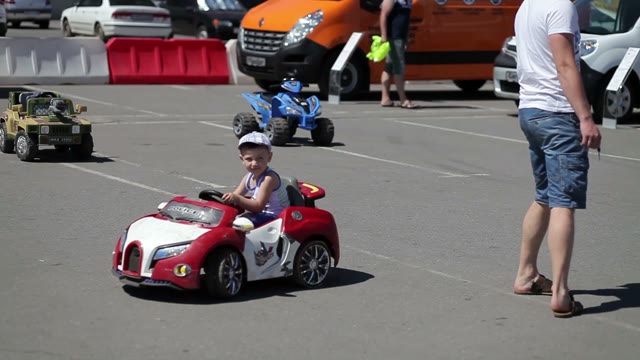 The Boy Goes To The Kid's Car