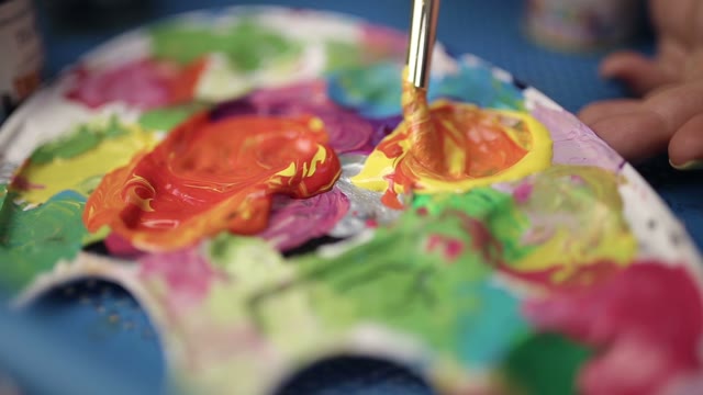 Art Brush Mixed Paint On The Palette