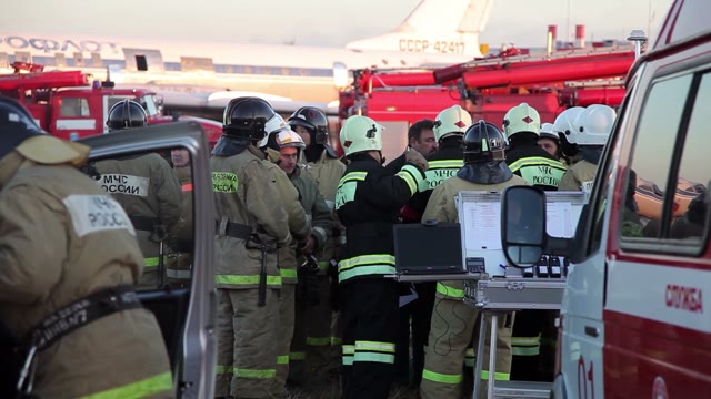 Rescuers And Firefighters Talking