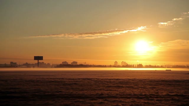 Orange Dawn On The Background Of The City