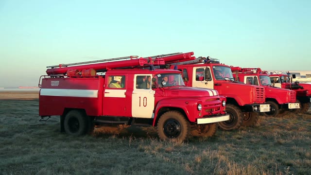 Fire Trucks In The Field