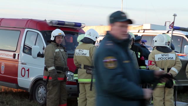 Rescuers And Firefighters Talking