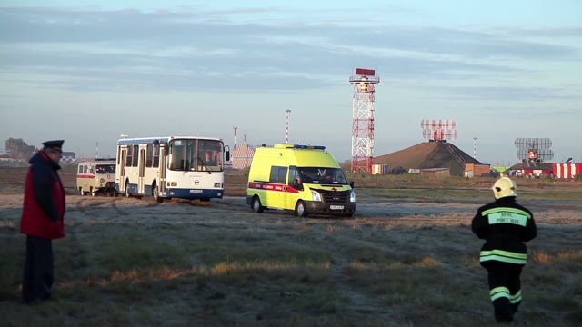 Firefighter Runs Up To The Ambulance