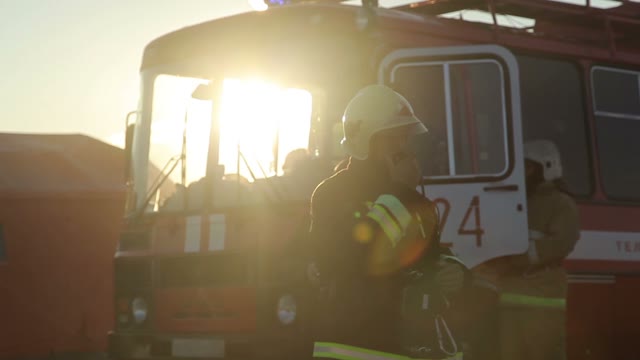 Firefighter Checks Radio
