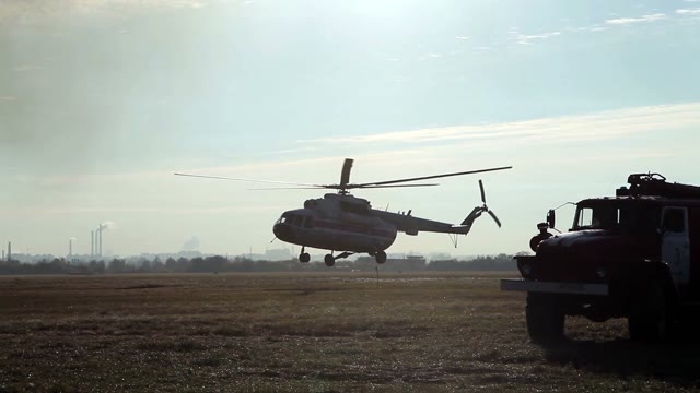 Helicopter Lands On The Field