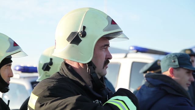 Firefighter With A Mustache In Helmet