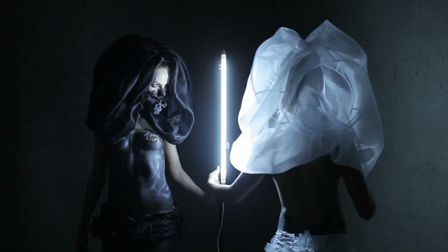 Two Models In Black And White. Lamp
