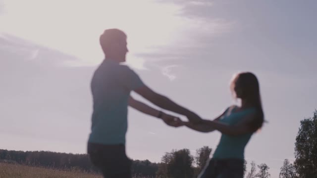 Beautiful Couple Holding Hands In Nature