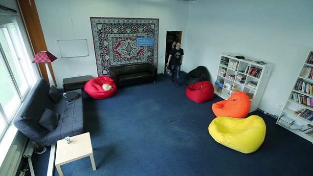 Young People With Laptops Come In The Room