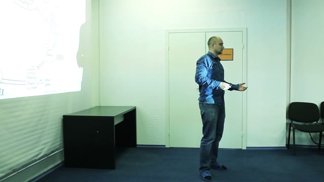 The Young Man Explained That The Group, Gestures And Displays Of The Projector