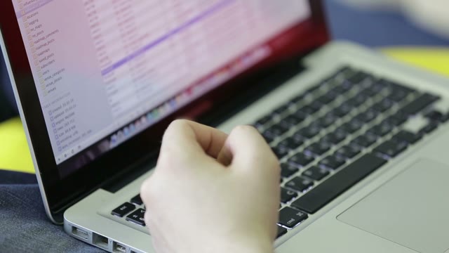 Close-up Of A Laptop. Man Working