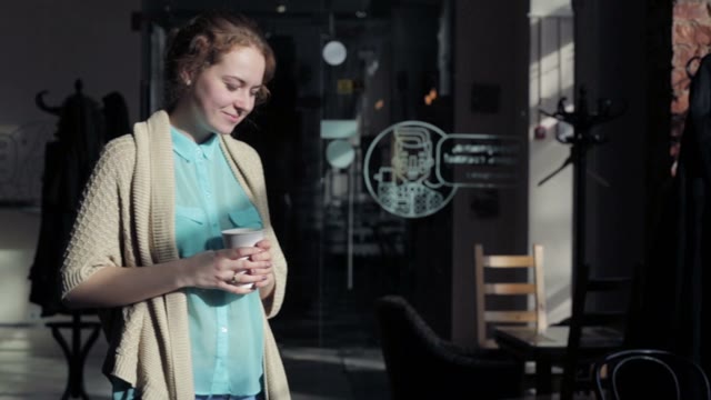 Young Girl Smiling And Enjoying Coffee