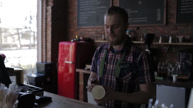 Barista Coffee House Wrote The Name On The Cup And Smiling