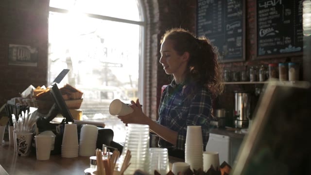 Barista Coffee House Wrote The Name On The Cup And Smiling