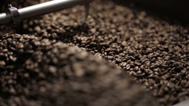Coffee Beans In The Roasting Machine. Selective Focus