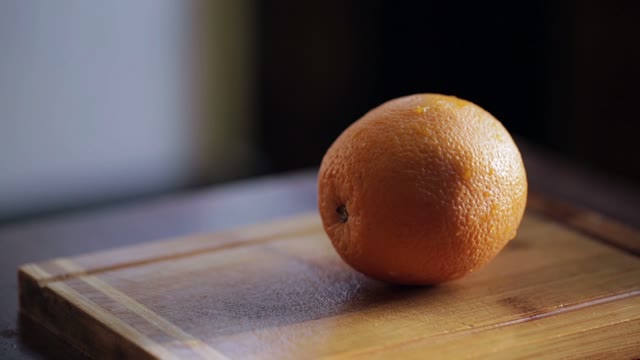 Big Juicy Orange Cut In Half. Close-up