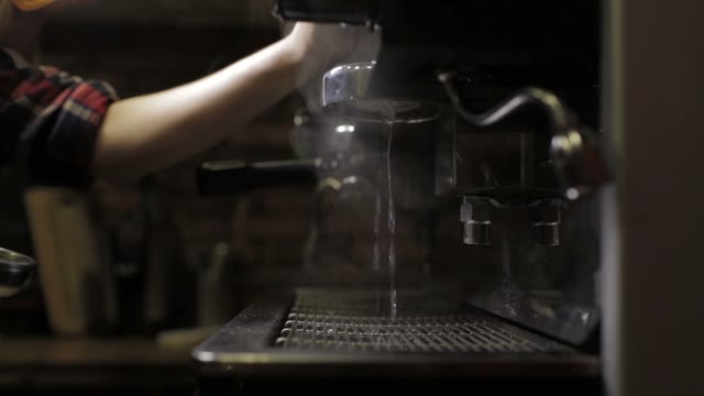 Barista Prepares Coffee Machine For Cappuccino