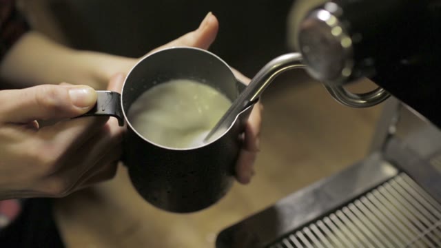 Coffee Maker Preparing Hot Milk Foam