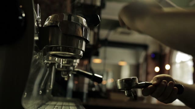 Barista Prepares Espresso Machine Before Preparing Coffee, Close-up