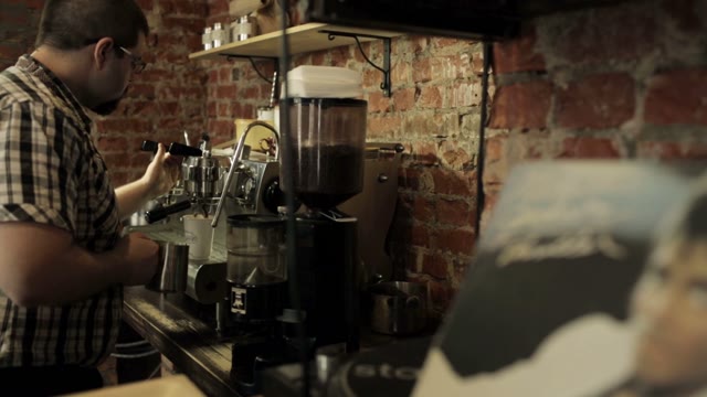 Barista At Work In The Coffeeshop