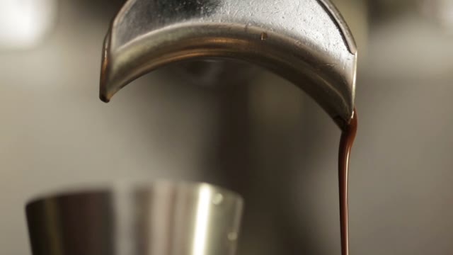 Coffee Flows From The Coffee Machine, Close Up