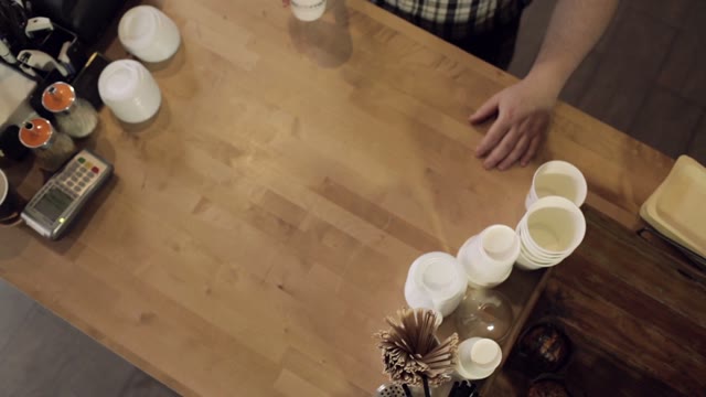 Barista Passes Coffee To Visitor. View From The Top