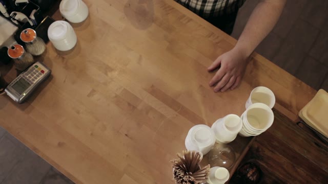 Barman Gives Up Coffee To Buyer. View From The Top