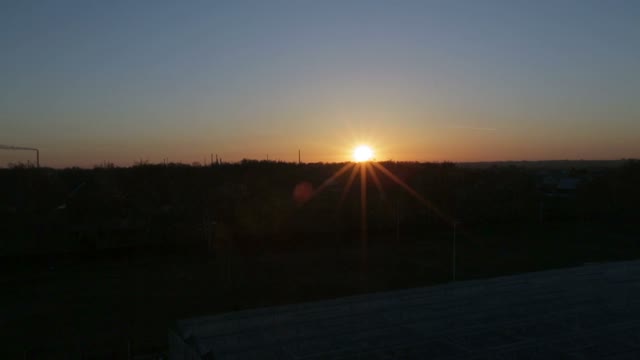 Panorama Roof A Huge Greenhouse. Reflection Of The Sun's Rays At The Corners Of