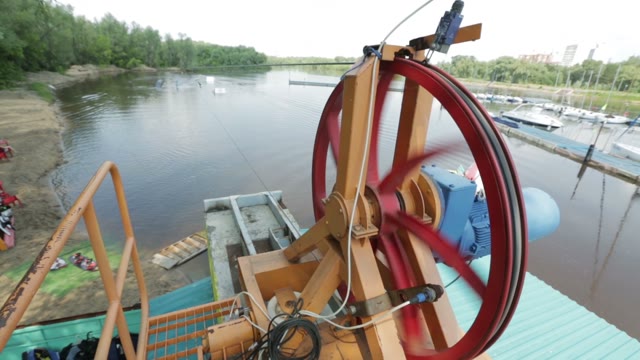 Reversible Winch Closeup. In The Background Wakeboarder Rides