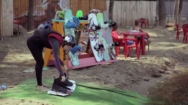 Beautiful Young Girl Prepared For Driving On A Wakeboard