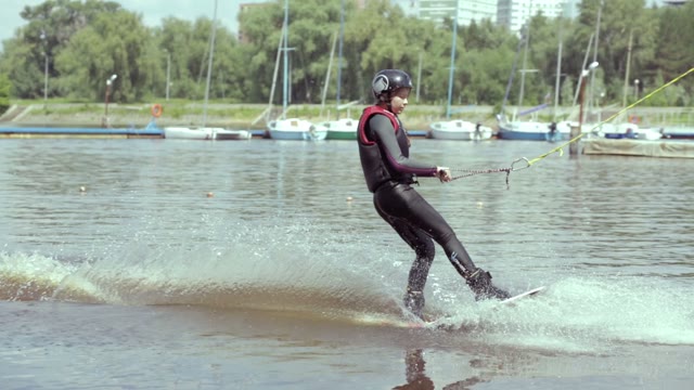 Pretty Young Girl Riding On Wakeboard
