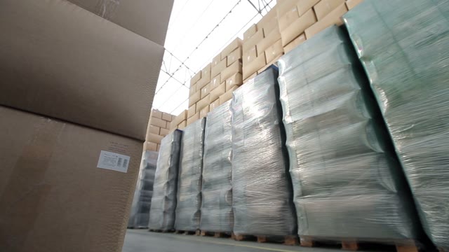 Warehouse With Boxes. Rides Loader