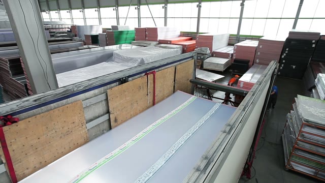 Workers Loaded Polycarbonate Sheets In The Truck