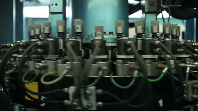 Close-up Of Rotating Machine In The Factory