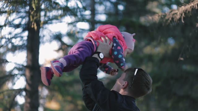 Funny Father Turns Her Daughter In Her Arms.