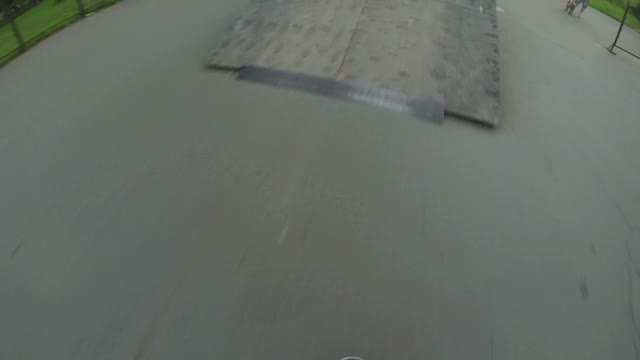 Skateboarder Doing A Stunt. Shooting From The First Person