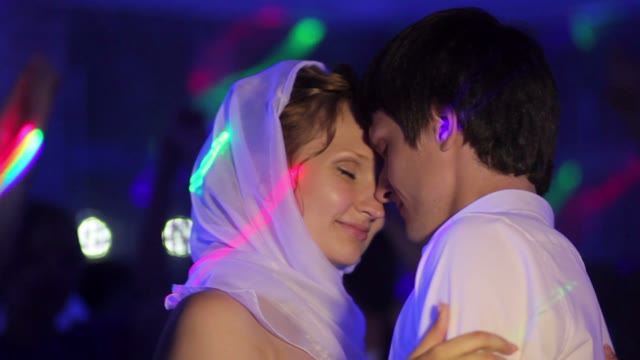 The Bride And Bridegroom Dancing A Slow Dance.