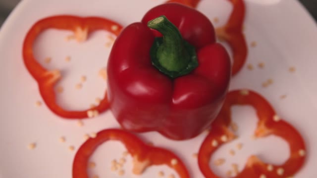 Bulgarian Pepper On A Rotating White Plate
