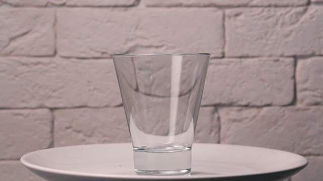 The Juice Is Poured Into A Glass