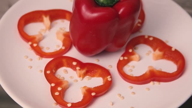 Sweet Pepper On A Rotating Plate. Close-up