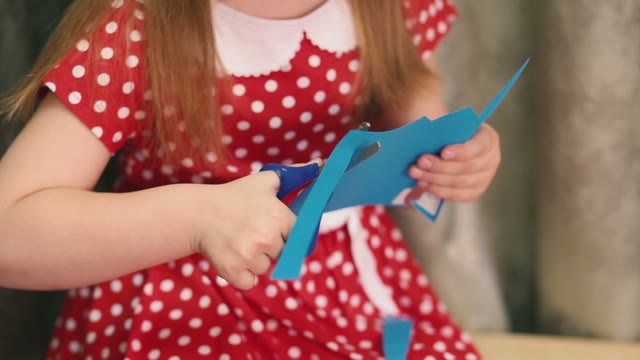Girl With A Red Bow On Her Head Cut Blue Image.