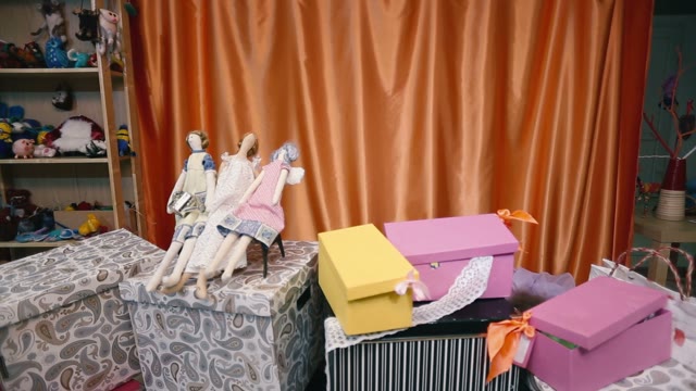 Small Children Jump Out Of The Beautiful Boxes.