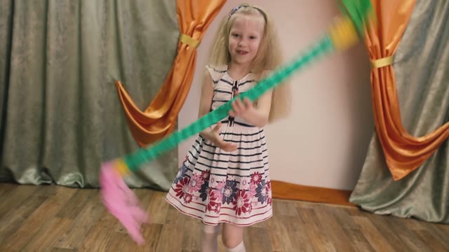 Little Blonde Showing Room With Color Stick.