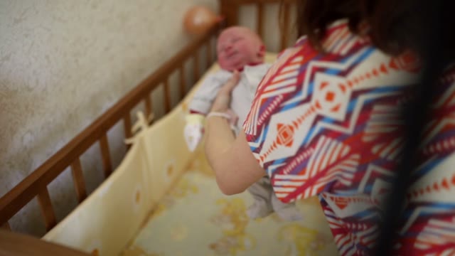 Toddler Put To Rest In The Cradle.
