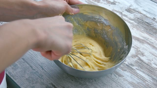 Preparation Of Cake. Corolla Mixing Dough. Close-up.