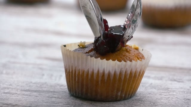Preparation Of Cake. Add The Stuffing. Close-up.